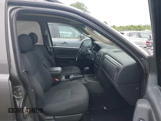 2003 Jeep Grand Cherokee Laredo z VIN 1J4GW48S73C545863, wystawiony jako IAAI lot #42222247 z przebiegiem 128 529 mil mil oraz . Historia ofert i sprzedaży dostępna na DreamBid. Obrazek 5.