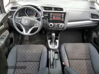 2016 Honda Fit LX with VIN JHMGK5H59GX004764, listed as a Copart auction lot 65131715 with 75,726 mi miles and Salvage title. Bid and sale history available at DreamBid. Image 8.