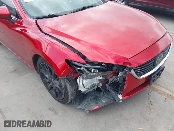 2016 Mazda 6 i Grand Touring z VIN JM1GJ1W58G1486694, wystawiony jako IAAI lot #42094443 z przebiegiem 77 803 mil mil oraz . Historia ofert i sprzedaży dostępna na DreamBid. Obrazek 6.