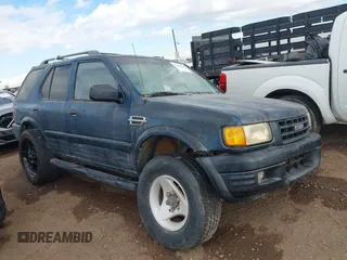 1999 Isuzu Rodeo S with VIN 4S2CK58W9X4325671, listed as a IAAI auction lot 41522884 with 195,811 mi miles and . Bid and sale history available at carsss.com. Image 1.