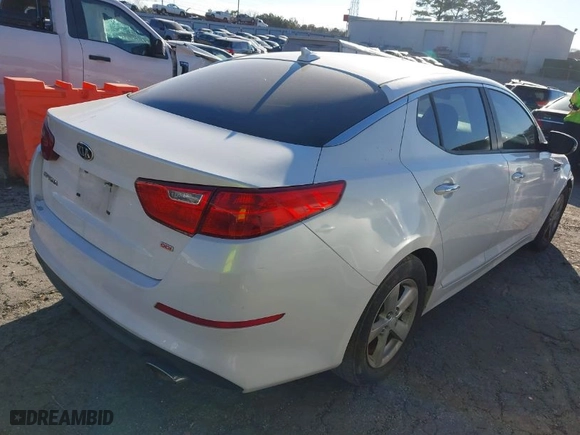 2015 Kia Optima LX with VIN KNAGM4A73F5601370, listed as a IAAI auction lot 41633083 with 164,752 mi miles. Bid and sale history available at carsss.com. Image 4.
