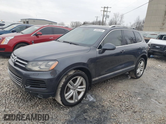 2012 Volkswagen Touareg Sport z VIN WVGFK9BP6CD005005, wystawiony jako Copart lot #46802355 z przebiegiem 141 430 mil mil oraz Czysty tytuł • Clean title. Historia ofert i sprzedaży dostępna na DreamBid. Obrazek 1.