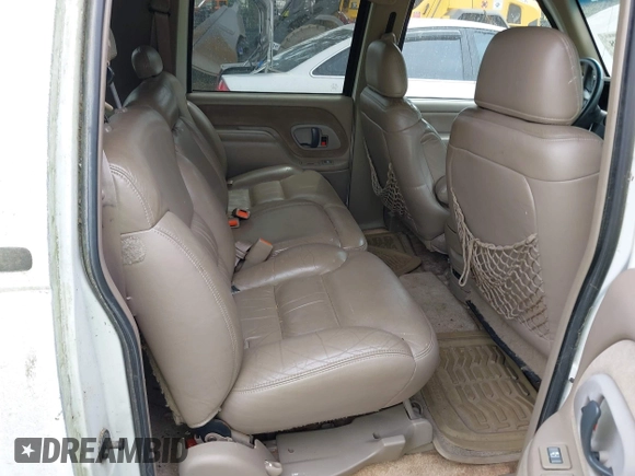 1999 GMC Suburban z VIN 1GKFK16R4XJ798754, wystawiony jako IAAI lot #41998578 z przebiegiem 266 899 mil mil oraz . Historia ofert i sprzedaży dostępna na DreamBid. Obrazek 8.
