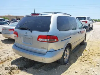 2002 Toyota Sienna LE z VIN 4T3ZF13C32U468403, wystawiony jako IAAI lot #42144703 z przebiegiem 211 578 mil mil oraz . Historia ofert i sprzedaży dostępna na DreamBid. Obrazek 4.