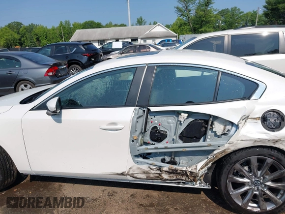 2022 Mazda 3 Carbon Edition with VIN 3MZBPACL0NM318573, listed as a IAAI auction lot 42403393 with 8,762 mi miles and . Bid and sale history available at DreamBid. Image 15.