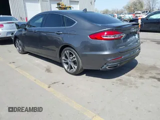 2019 Ford Fusion Titanium with VIN 3FA6P0D90KR109985, listed as a IAAI auction lot 41993329 with Not provided miles and . Bid and sale history available at DreamBid. Image 3.