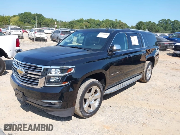 2015 Chevrolet Suburban LTZ with VIN 1GNSKKKC7FR205638, listed as a IAAI auction lot 40284367 with 103,530 mi miles and . Bid and sale history available at DreamBid. Image 2.