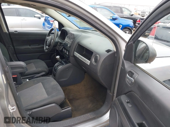 2016 Jeep Compass Sport with VIN 1C4NJDBB8GD780146, listed as a IAAI auction lot 41792416 with 127,548 mi miles. Bid and sale history available at carsss.com. Image 5.