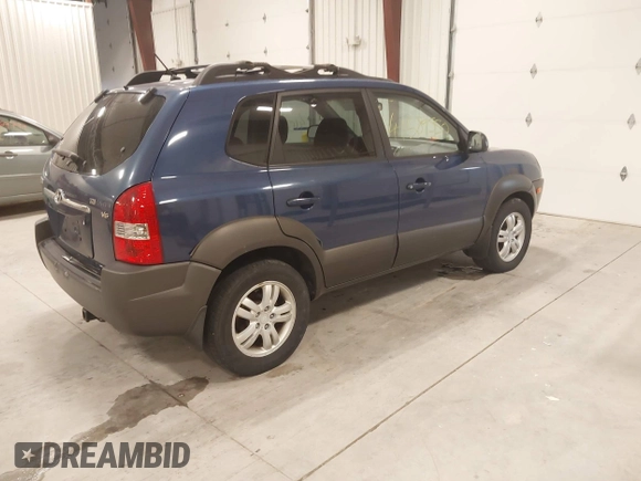 2006 Hyundai Tucson GLS with VIN KM8JN12D66U409645, listed as a IAAI auction lot 41589550 with 111,850 mi miles. Bid and sale history available at carsss.com. Image 4.