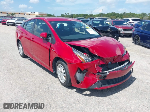 2021 Toyota Prius L Eco with VIN JTDKAMFU4M3145215, listed as a IAAI auction lot 42281566 with 74,220 mi miles and . Bid and sale history available at DreamBid. Image 1.