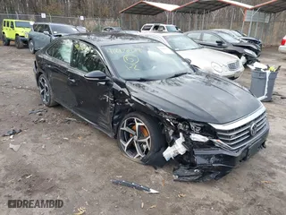 2021 Volkswagen Passat 2.0T R-Line with VIN 1VWMA7A36MC010128, listed as a IAAI auction lot 41206478 with 60,045 mi miles. Bid and sale history available at carsss.com. Image 1.