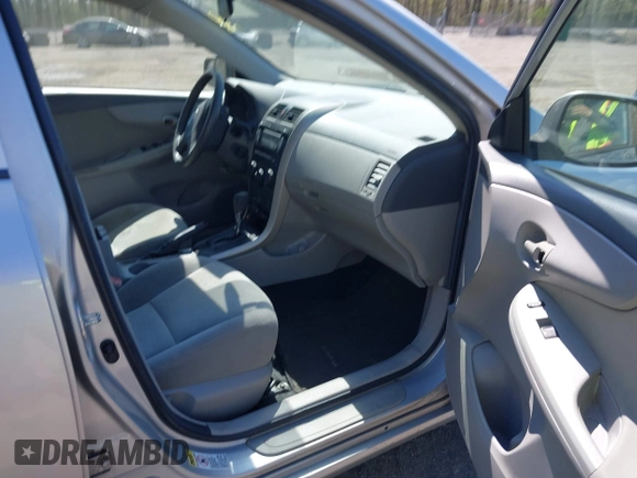 2009 Toyota Corolla with VIN 2T1BU40E69C142856, listed as a IAAI auction lot 42045414 with 238,154 mi miles. Bid and sale history available at carsss.com. Image 5.
