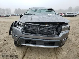 2024 Nissan Frontier PRO-4X with VIN 1N6ED1EK5RN627574, listed as a Copart auction lot 43977725 with 12,019 mi miles and Salvage Title. Bid and sale history available at carsss.com. Image 5.
