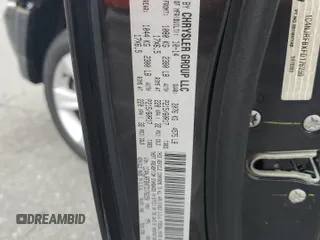 2015 Jeep Patriot Latitude with VIN 1C4NJRFBXFD176250, listed as a Copart auction lot 58903295 with 72,675 mi miles and Salvage title. Bid and sale history available at DreamBid. Image 13.