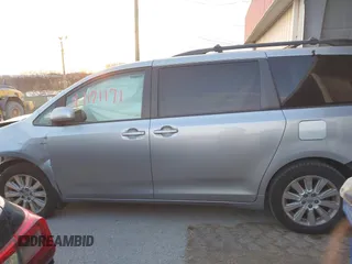2016 Toyota Sienna LE with VIN 5TDJK3DC4GS133694, listed as a IAAI auction lot 41171171 with 99,680 mi miles. Bid and sale history available at carsss.com. Image 14.