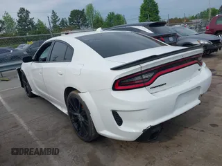 2018 Dodge Charger R/T with VIN 2C3CDXCT9JH265601, listed as a IAAI auction lot 41979466 with 107,842 mi miles and . Bid and sale history available at DreamBid. Image 14.