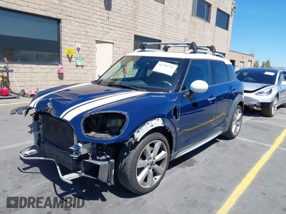 2017 MINI Countryman Cooper S z VIN WMZYT3C39H3D97769, wystawiony jako IAAI lot #42794779 z przebiegiem 126 880 mil mil oraz . Historia ofert i sprzedaży dostępna na DreamBid. Obrazek 6.