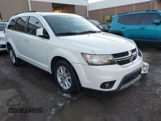 2018 Dodge Journey SXT with VIN 3C4PDCBG4JT514453, listed as a IAAI auction lot 41406727 with 121,235 mi miles. Bid and sale history available at carsss.com. Image 1.