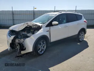 2016 Ford Escape Titanium with VIN 1FMCU0J99GUB83458, listed as a Copart auction lot 48828195 with 74,250 mi miles and Salvage Title. Bid and sale history available at carsss.com. Image 1.