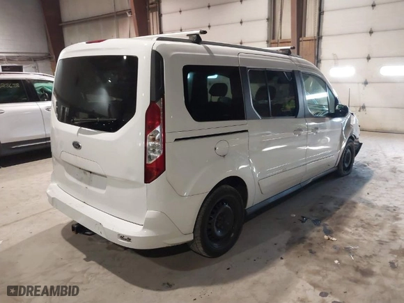 2016 Ford Transit Connect Wagon XLT with VIN NM0GE9F7XG1281542, listed as a IAAI auction lot 41307372 with 84,386 mi miles. Bid and sale history available at carsss.com. Image 4.