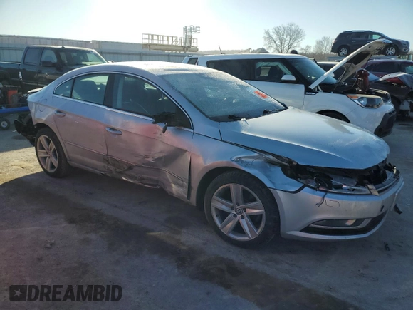 2014 Volkswagen CC Sport z VIN WVWBP7AN2EE505913, wystawiony jako Copart lot #42380915 z przebiegiem 98 976 mil mil oraz Szkoda całkowita • Salvage title. Historia ofert i sprzedaży dostępna na DreamBid. Obrazek 4.