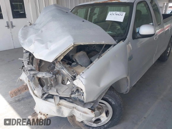 2003 Ford F-150 XL with VIN 1FTRX17213NB36760, listed as a IAAI auction lot 42170424 with 130,768 mi miles and . Bid and sale history available at DreamBid. Image 6.