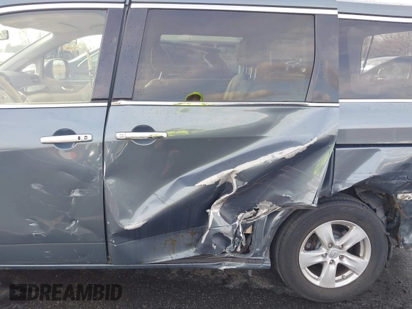 2013 Nissan Quest LE with VIN JN8AE2KP2D9066986, listed as a IAAI auction lot 41022861 with 122,869 mi miles. Bid and sale history available at carsss.com. Image 6.