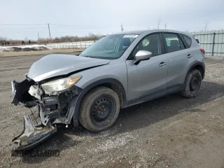 2014 Mazda CX-5 Sport with VIN JM3KE2BE2E0318246, listed as a Copart auction lot 50785935 with 235,475 mi miles and Salvage Title. Bid and sale history available at carsss.com. Image 1.