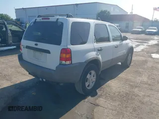 2002 Ford Escape XLT Choice with VIN 1FMYU03132KD02414, listed as a IAAI auction lot 42121509 with 218,148 mi miles and . Bid and sale history available at DreamBid. Image 4.