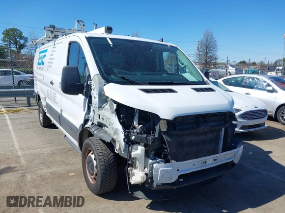 2020 Ford Transit Cargo z VIN 1FTBR1Y84LKB79621, wystawiony jako IAAI lot #41802213 z przebiegiem 89 167 mil mil oraz . Historia ofert i sprzedaży dostępna na DreamBid. Obrazek 1.