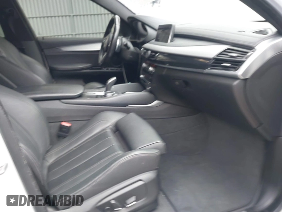 2018 BMW X6 sDrive35i with VIN 5UXKU0C56J0G81224, listed as a IAAI auction lot 41734077 with 121,145 mi miles. Bid and sale history available at carsss.com. Image 5.