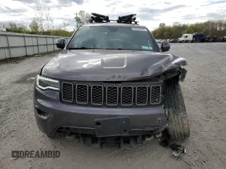 2016 Jeep Grand Cherokee Limited 75th Anniversary with VIN 1C4RJFBG4GC489464, listed as a Copart auction lot 55278935 with 176,572 mi miles and Salvage Title. Bid and sale history available at DreamBid. Image 5.