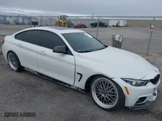 2019 BMW 4 Series 440i with VIN WBA4J5C55KBM66322, listed as a IAAI auction lot 41571994 with 62,898 mi miles. Bid and sale history available at carsss.com. Image 1.
