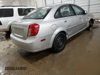 2005 Suzuki Forenza S z VIN KL5JD56Z85K195763, wystawiony jako Copart lot #75531224 z przebiegiem 33 368 mil mil oraz Szkody całkowita. Historia ofert i sprzedaży dostępna na DreamBid. Obrazek 3.