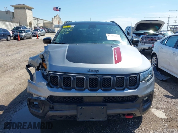 2023 Jeep Compass Trailhawk with VIN 3C4NJDDN2PT567047, listed as a IAAI auction lot 42376543 with 41,924 mi miles and . Bid and sale history available at DreamBid. Image 12.