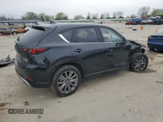 2024 Mazda CX-5 2.5 Turbo Signature with VIN JM3KFBXY6R0401491, listed as a Copart auction lot 52446225 with 13,951 mi miles and Salvage Title. Bid and sale history available at carsss.com. Image 3.