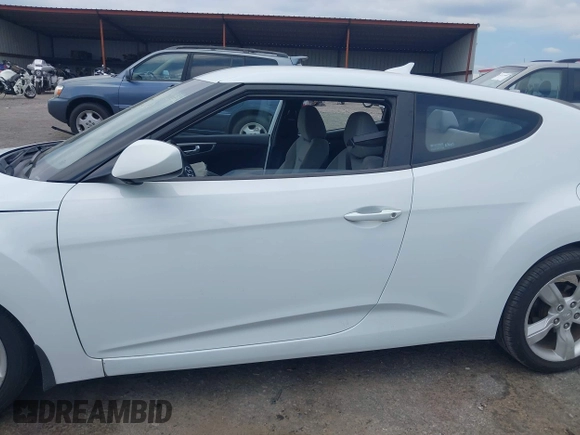 2012 Hyundai Veloster w/Gray Int с VIN KMHTC6AD6CU026944, выставлен на аукционе IAAI как лот 42216988 с пробегом 61 147 миль миль и . История ставок и продаж доступна на DreamBid. Изображение 14.