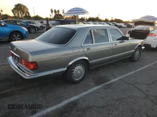 1988 Mercedes-Benz 560 with VIN WDBCA39D4JA391164, listed as a Copart auction lot 82628704 with 88,482 mi miles and Clean Title. Bid and sale history available at DreamBid. Image 3.