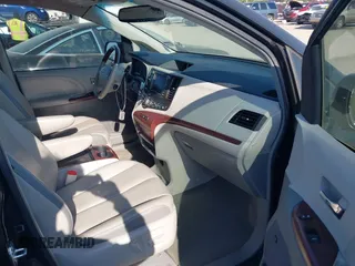 2013 Toyota Sienna XLE AAS with VIN 5TDYK3DC0DS293680, listed as a IAAI auction lot 42033734 with 136,171 mi miles and . Bid and sale history available at carsss.com. Image 5.
