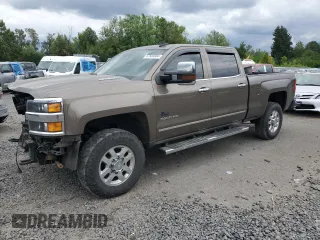 2015 Chevrolet Silverado 3500HD LTZ with VIN 1GC4K0E88FF572157, listed as a Copart auction lot 67583004 with 156,783 mi miles and Salvage Title. Bid and sale history available at carsss.com. Image 1.