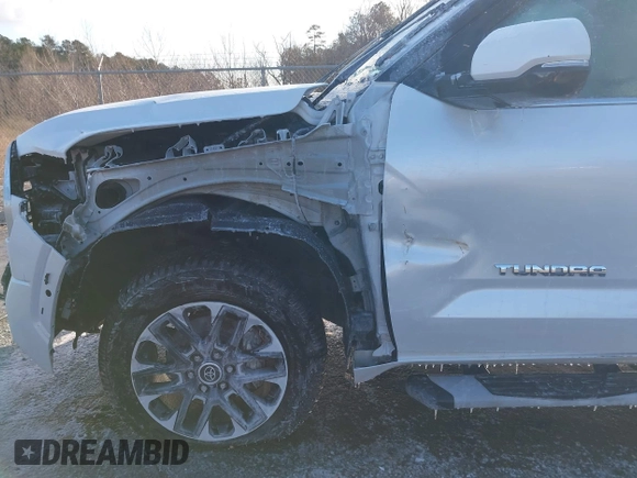2023 Toyota Tundra Limited with VIN 5TFJA5DB8PX070681, listed as a IAAI auction lot 41617433 with 57,693 mi miles and . Bid and sale history available at DreamBid. Image 18.