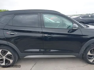 2017 Hyundai Tucson Value with VIN KM8J33A26HU362363, listed as a IAAI auction lot 41940376 with 127,986 mi miles. Bid and sale history available at carsss.com. Image 13.