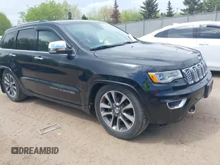 2017 Jeep Grand Cherokee Overland z VIN 1C4RJFCG2HC700032, wystawiony jako IAAI lot #42241938 z przebiegiem 52 669 mil mil oraz . Historia ofert i sprzedaży dostępna na DreamBid. Obrazek 1.