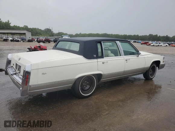 1992 Cadillac Brougham with VIN 1G6DW54E5NR708009, listed as a Copart auction lot 56849345 with 83,203 mi miles and Salvage title. Bid and sale history available at DreamBid. Image 3.