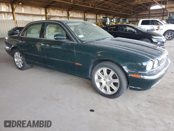 2004 Jaguar XJ with VIN SAJWA71C04SG20211, listed as a Copart auction lot 78713334 with 43,169 mi miles and Clean Title. Bid and sale history available at carsss.com. Image 4.