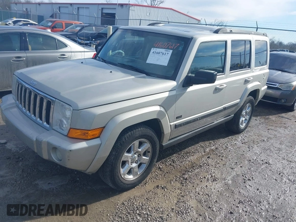 2007 Jeep Commander Sport z VIN 1J8HG48KX7C669647, wystawiony jako IAAI lot #41607617 z przebiegiem 333 861 mil mil oraz . Historia ofert i sprzedaży dostępna na DreamBid. Obrazek 2.