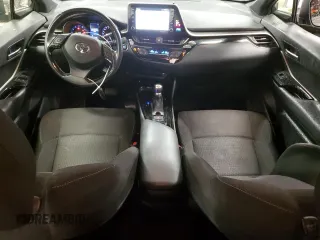 2019 Toyota C-HR XLE with VIN JTNKHMBX0K1035830, listed as a Copart auction lot 52561095 with 98,412 mi miles and Clean Title. Bid and sale history available at carsss.com. Image 8.