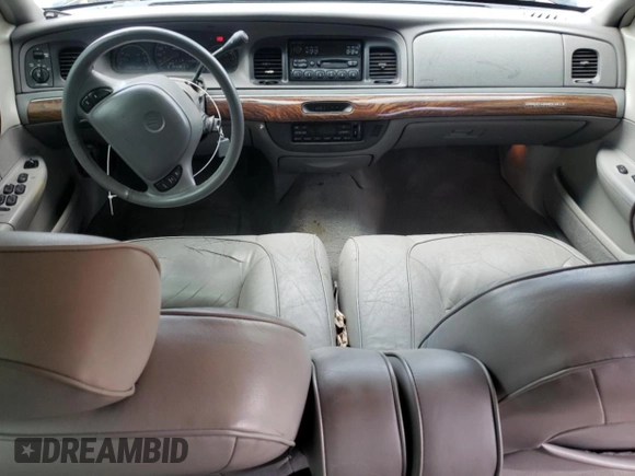 1999 Mercury Grand Marquis LS с VIN 2MEFM75W2XX683074, выставлен на аукционе Copart как лот 55679225 с пробегом 198 956 миль миль и Списание • Salvage title. История ставок и продаж доступна на DreamBid. Изображение 8.