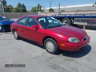 1997 Mercury Sable GS z VIN 1MELM50U6VG651910, wystawiony jako IAAI lot #42494879 z przebiegiem 70 304 mil mil oraz . Historia ofert i sprzedaży dostępna na DreamBid. Obrazek 1.