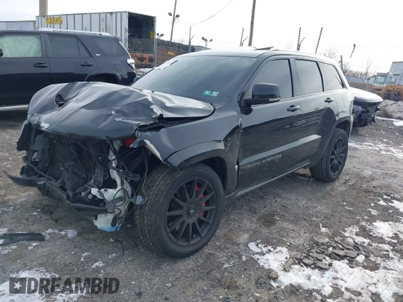 2017 Jeep Grand Cherokee SRT with VIN 1C4RJFDJ7HC641926, listed as a IAAI auction lot 41272215 with 117,667 mi miles. Bid and sale history available at carsss.com. Image 16.